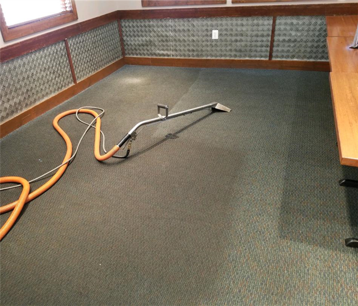 before & after of carpet cleaning done at a local restaurant