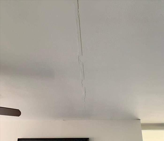 cracked seams on a white ceiling 