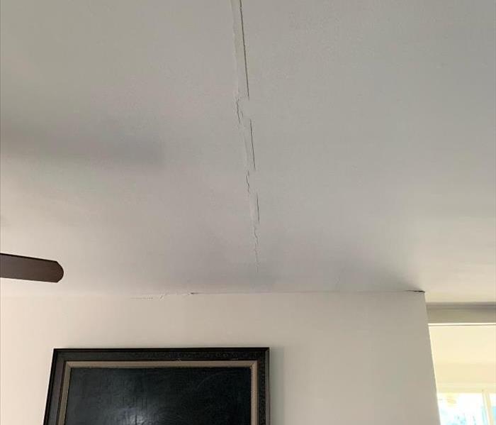 crack on ceiling from water damage